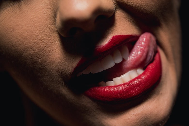 a woman sticking out her tongue 