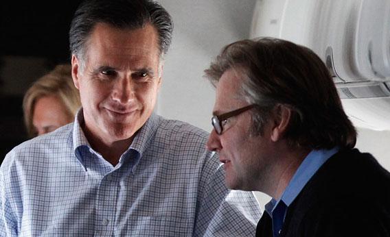  Republican presidential candidate and former Massachusetts Governor Mitt Romney (L) talks with campaign advisor Eric Fehrnstrom (R) 