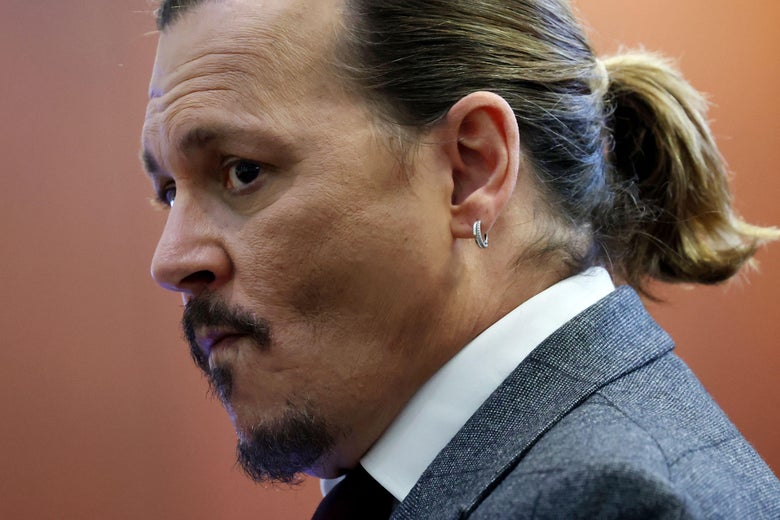 Johnny Depp seen in profile.