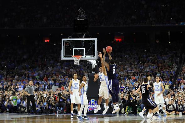 Villanova's Kris Jenkins was wide open because Brice Johnson was under the  rim.