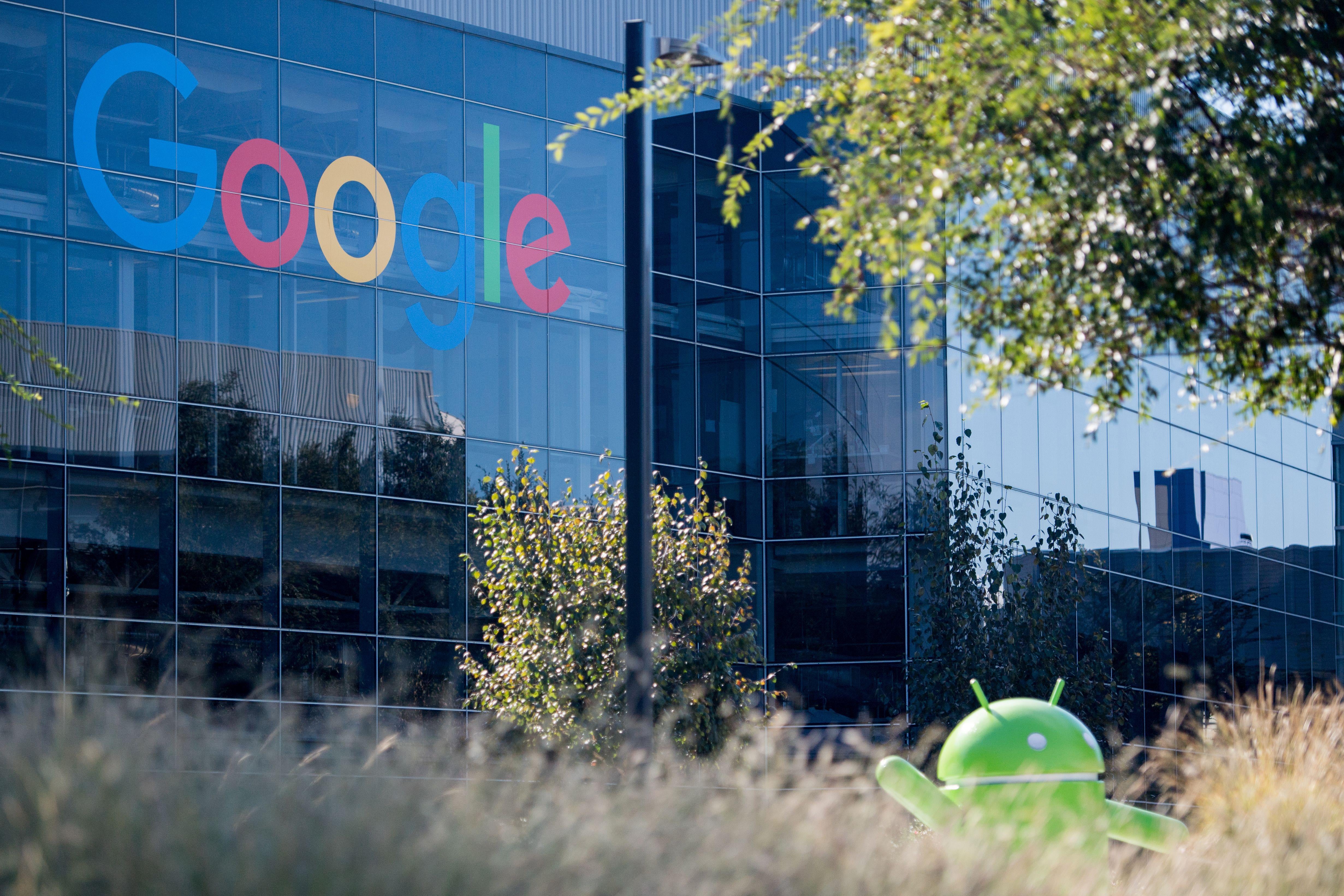 A Google logo and Android statue are seen at the Googleplex in Menlo Park, California on November 4, 2016.  / AFP PHOTO / JOSH EDELSON        (Photo credit should read JOSH EDELSON/AFP/Getty Images)