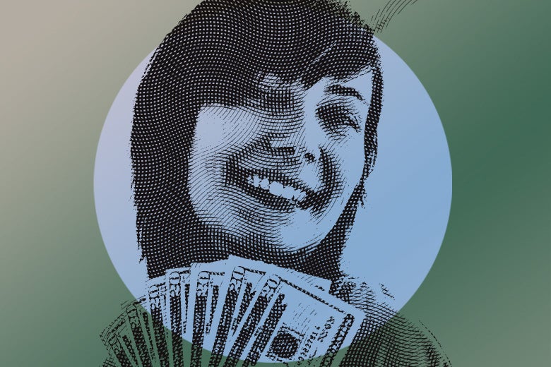 A girl with a hand full of money and a big smile. 