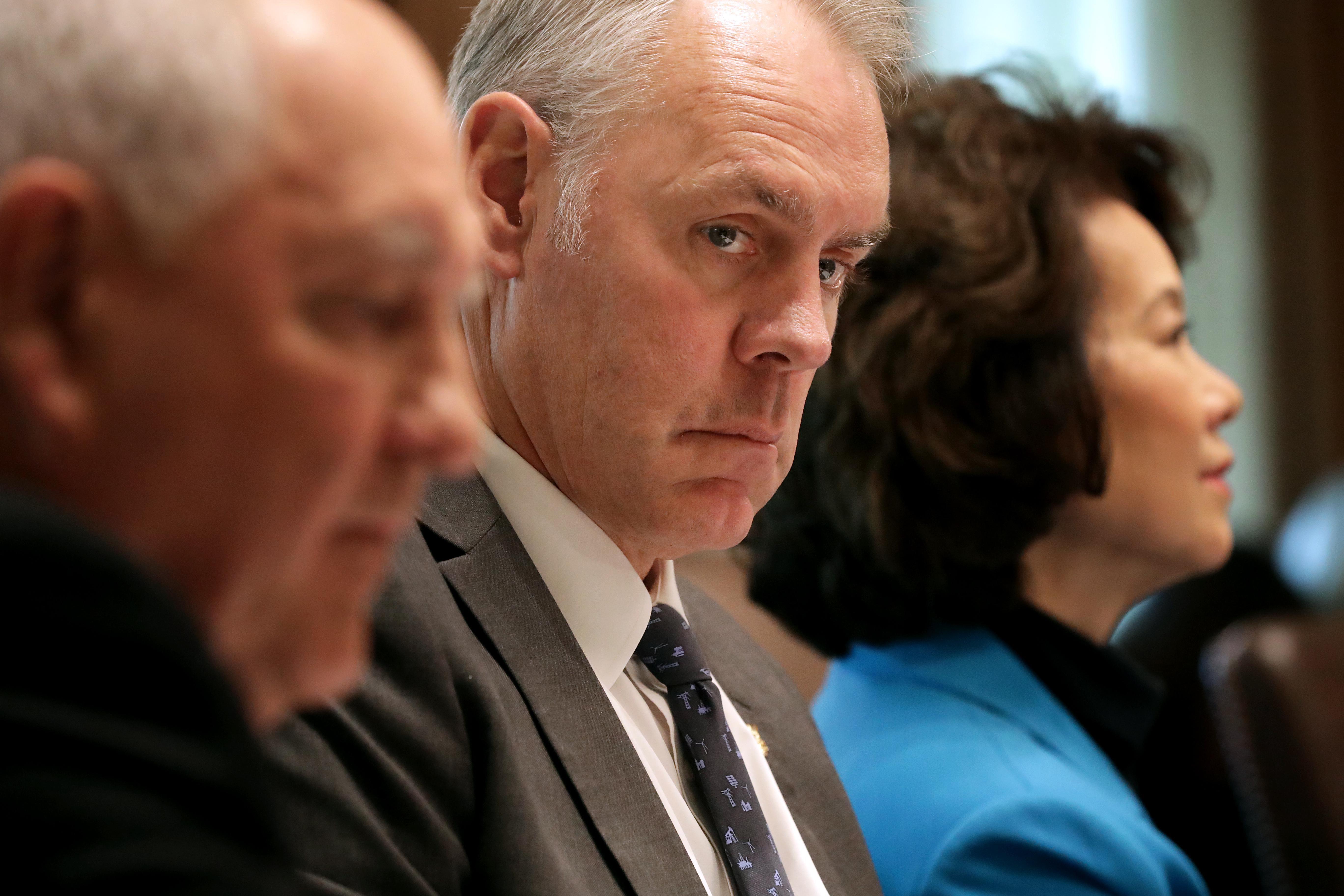 Ryan Zinke at a cabinet meeting in the White House 