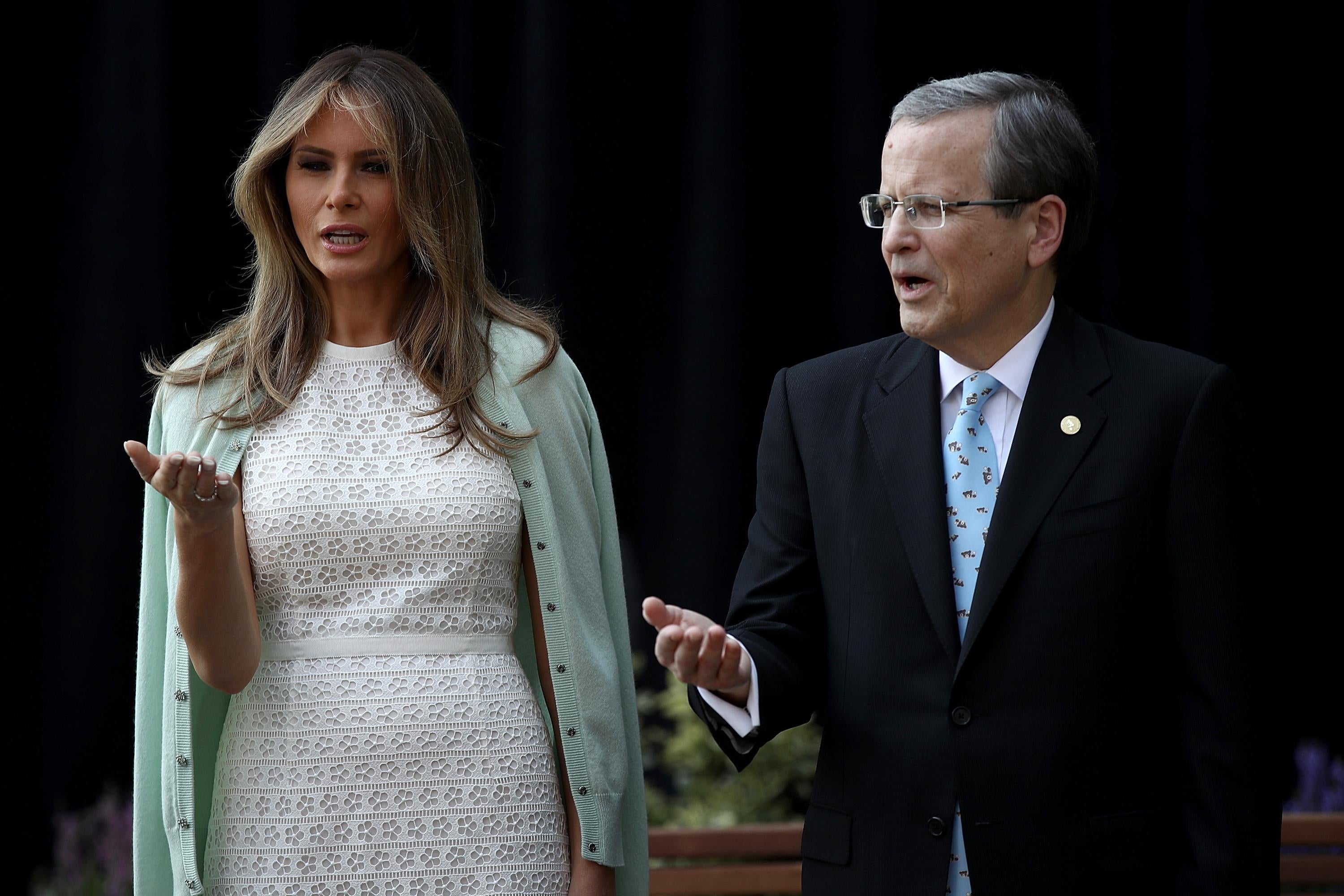 WASHINGTON, DC - APRIL 28: U.S. first lady Melania Trump takes part in a 'Blessing of the Garden' with Michael Williams (R), chairman of the board, at the Children's National Health System April 28, 2017 in Washington, DC. Trump spoke a the opening of the Bunny Mellon Healing Garden for patients and famlies, an outdoor location for to safely spend time outdoors while receiving treatment at the hospital. (Photo by Win McNamee/Getty Images)