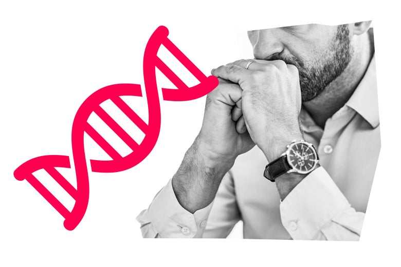 A man looks pensive next to a DNA strand.