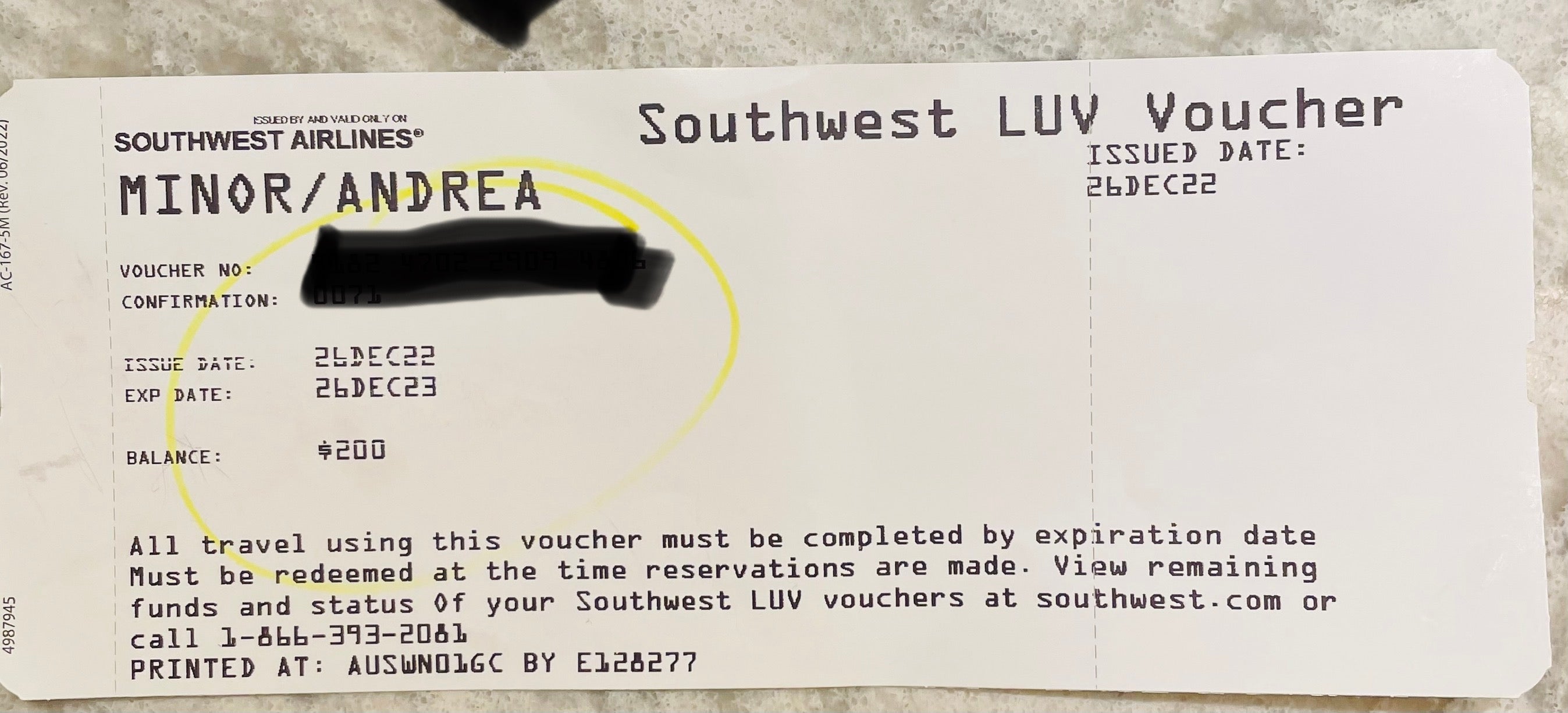 A rectangular piece of paper in the shape of an airline ticket. At the top it says "Southwest LUV Voucher." The balance is shown as $200. 