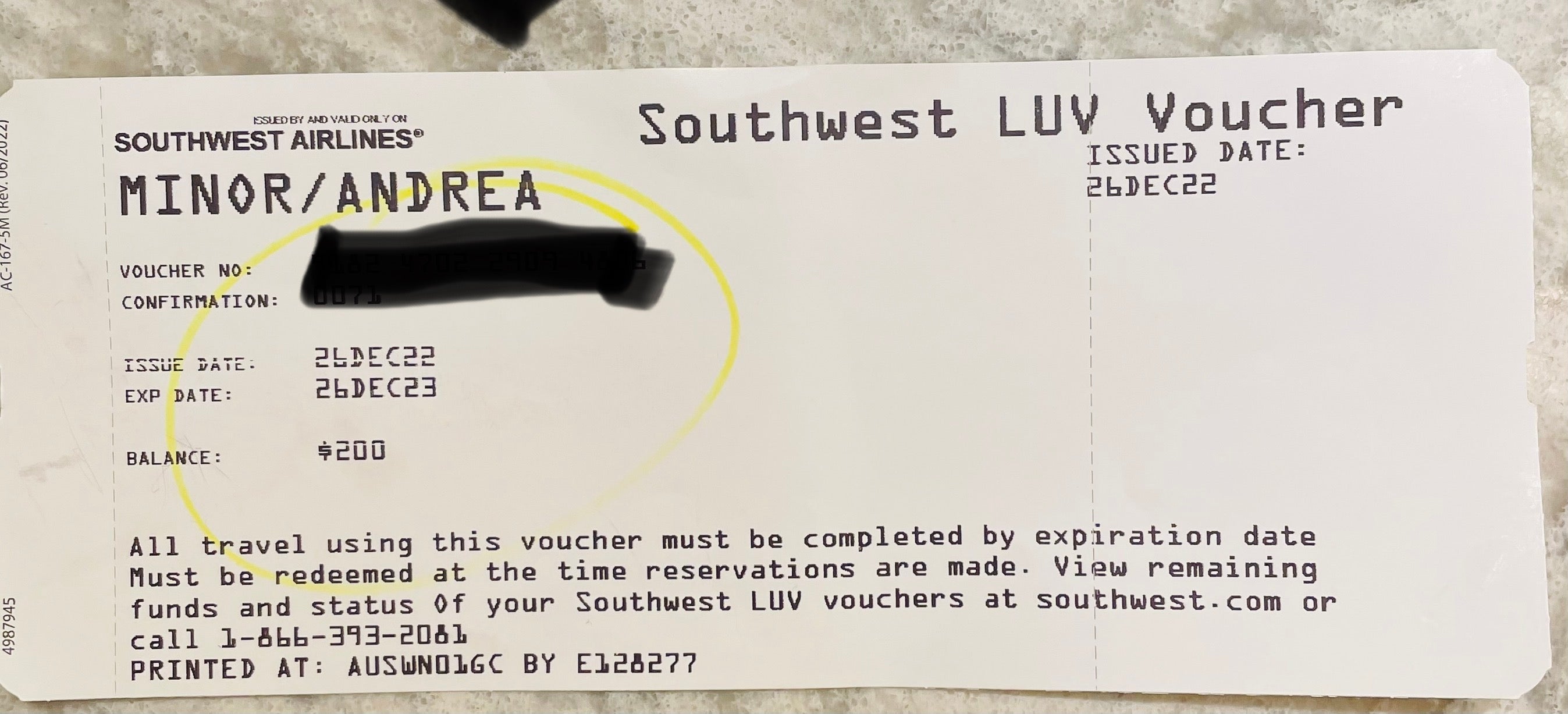 A rectangular piece of paper in the shape of an airline ticket. At the top it says "Southwest LUV Voucher." The balance is shown as $200.