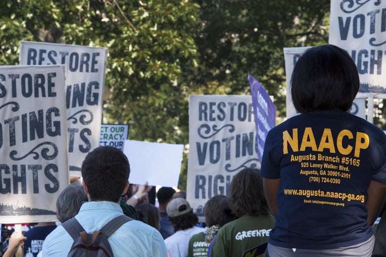 Various labor unions and progressive organizations protest on Capitol Hill.