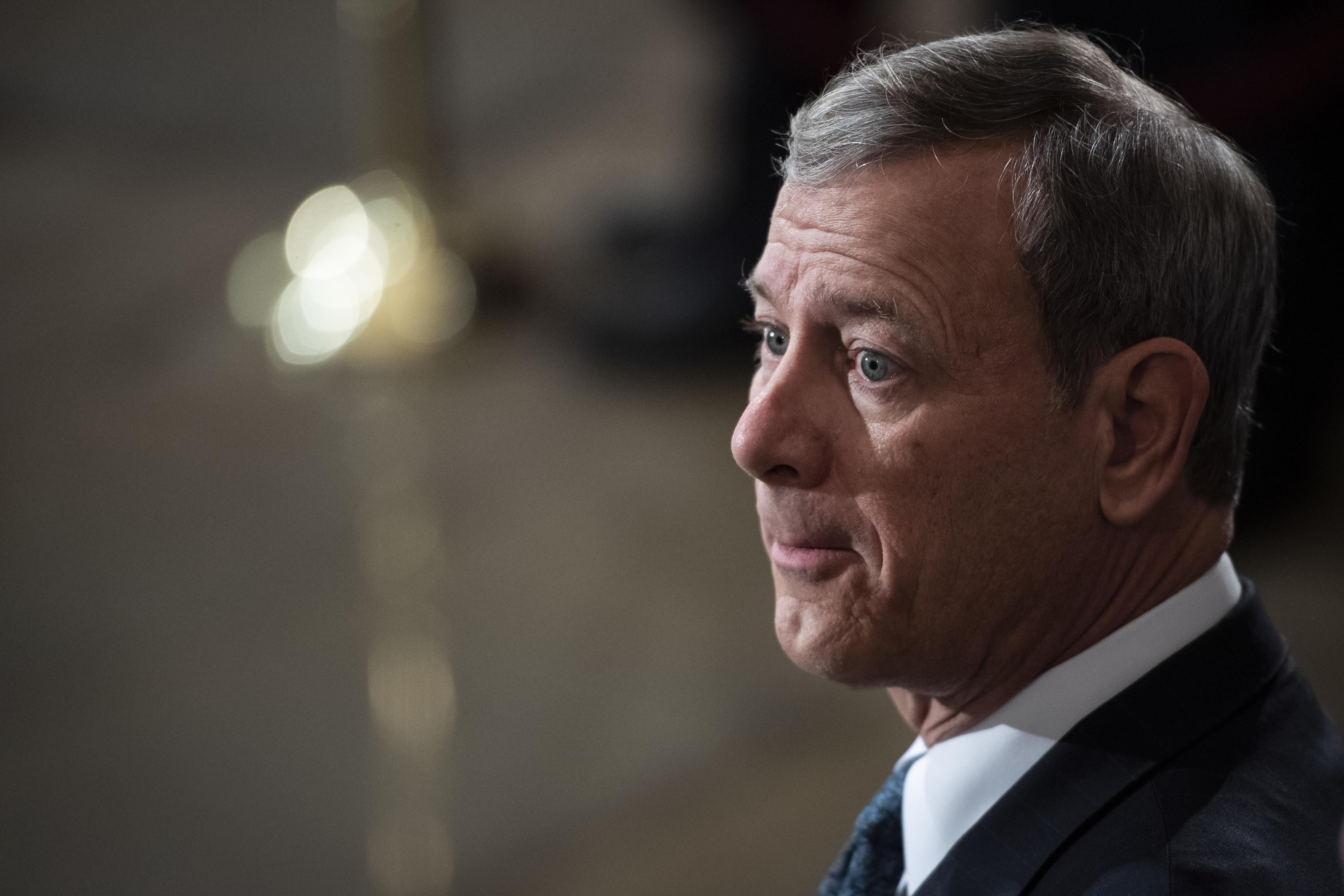 Chief Justice John Roberts waits for the arrival of former U.S. President George H.W. Bush at the U.S Capitol Rotunda on December 03, 2018 in Washington, D.C.