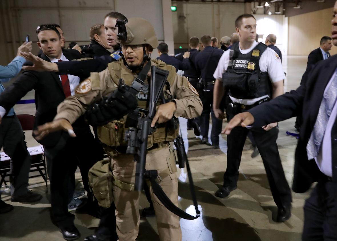 Watch Secret Service rush Trump off stage following disturbance at Reno  rally.