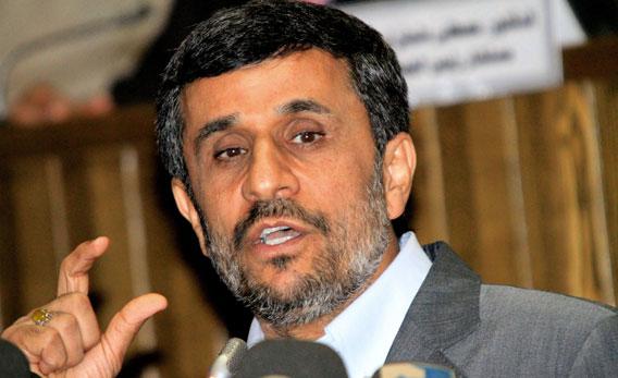 Iranian President Mahmoud Ahmadinejad delivers a speech during a symposium on 'The Future of the Islamic World in the Midst of International Challenges' in the Sudanese capital Khartoum during his official visit on September 26, 2011.