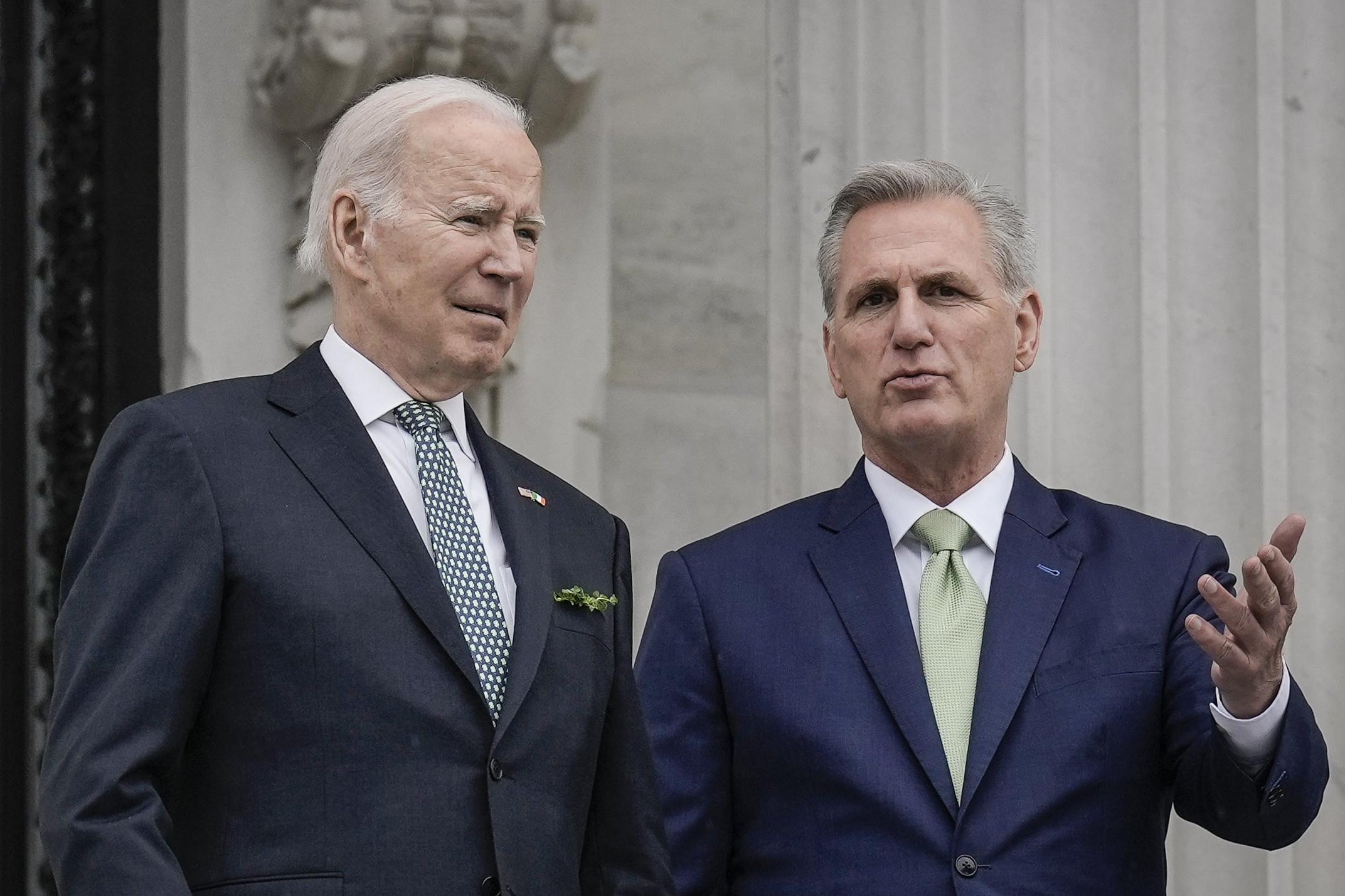 A photo of President Biden and Speaker of the House Kevin McCarthy.