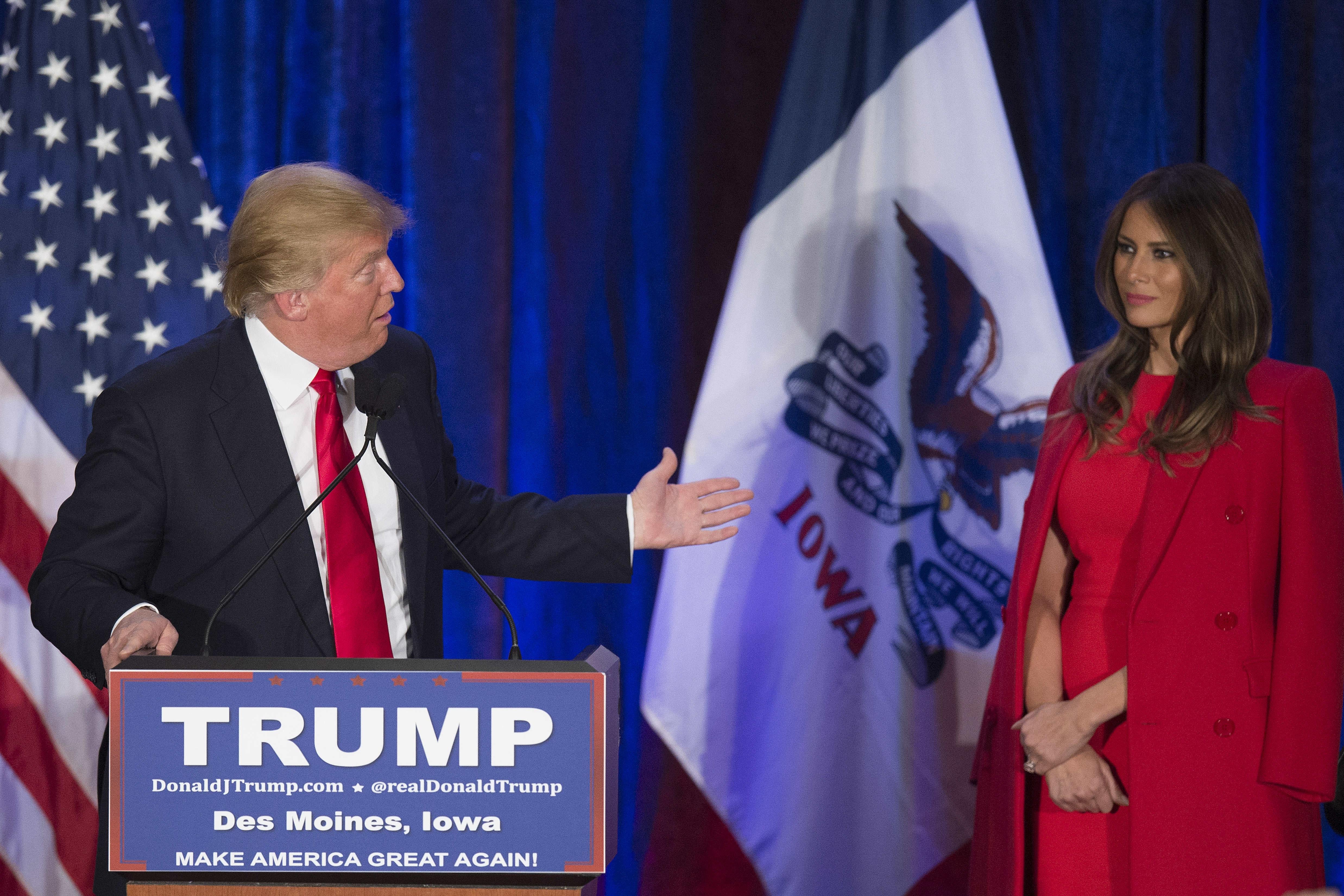 Republican Presidential candidate Donald Trump (L) thanks his wife Melania (R) as he addresses his supporters after finishing second in the Iowa Caucus, in West Des Moines, Iowa, February 1, 2016.
Republican Senator Ted Cruz has won the Iowa caucuses -- the first vote in the US presidential race -- in a tight contest with frontrunner Donald Trump and Senator Marco Rubio, US media projections showed. / AFP / Jim WATSON (Photo credit should read JIM WATSON/AFP/Getty Images)