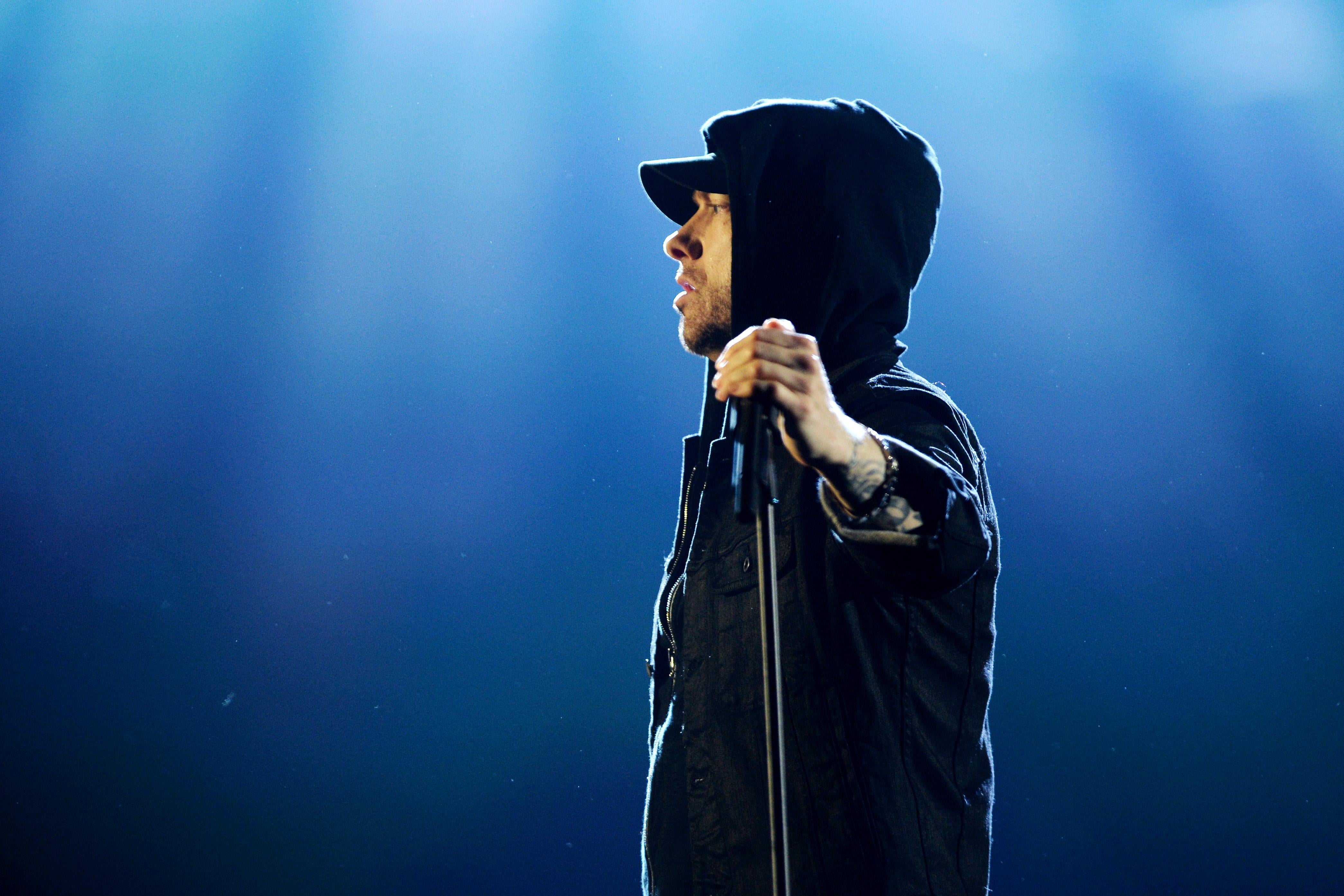 Eminem performs on stage.