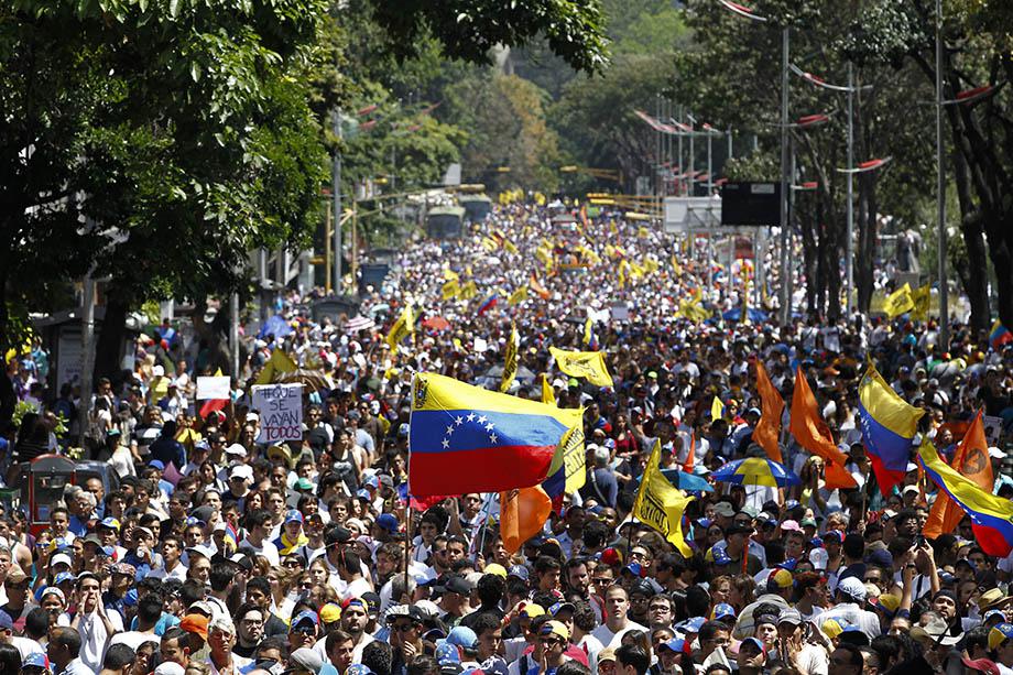 Opposition demonstrators take part in a protest against Venezuela's President Nicolas Maduro's government in Caracas.