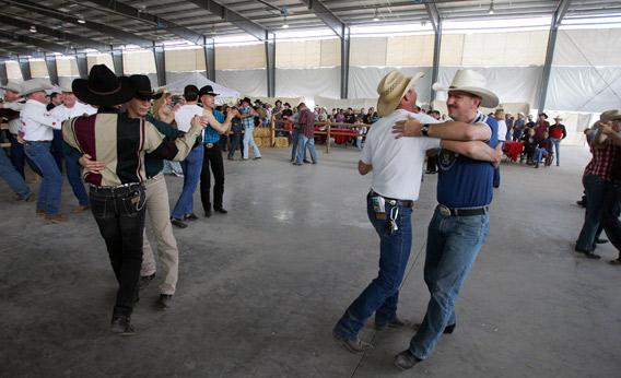 Couples dance at the International Gay Rodeo Association.