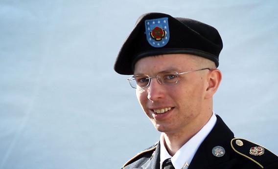 U.S. Army Private Bradley Manning is escorted as he leaves a military court at the end of the first of a three-day motion hearing June 6, 2012 in Fort Meade, Maryland.