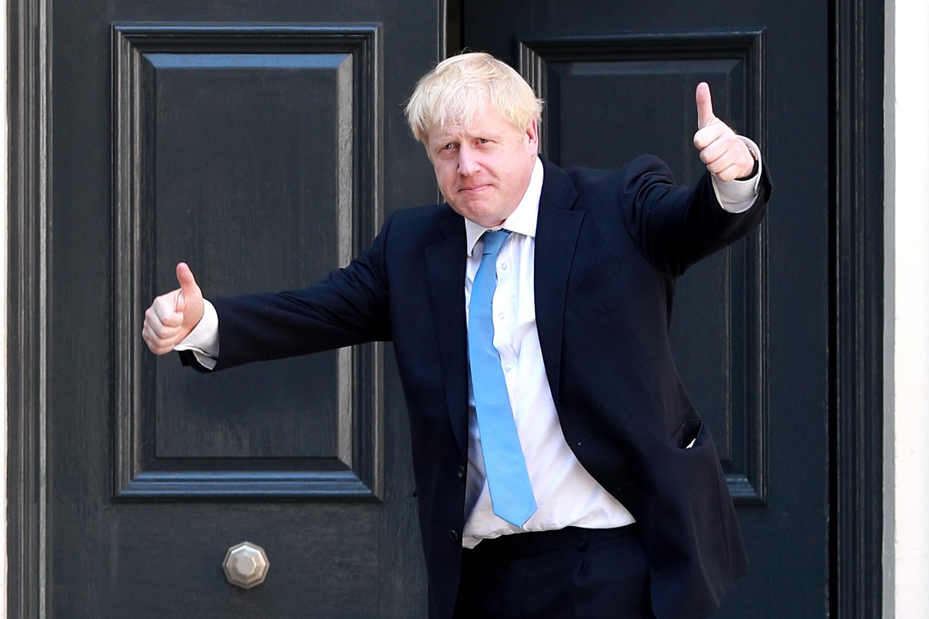 Boris Johnson gives a double thumbs-up.