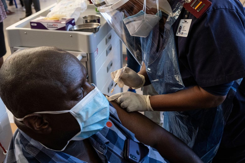 A health worker administers the Johnson & Johnson vaccine to a health worker at the Chris Hani Baragwanath Hospital in Soweto, South Africa on February 17, 2021. 