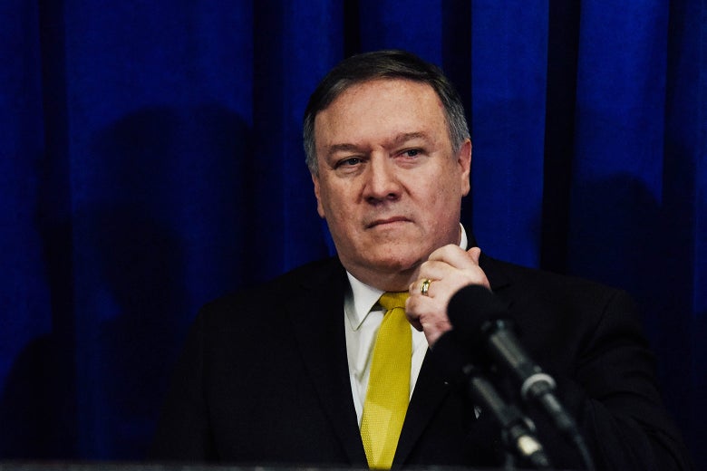 Mike Pompeo behind a microphone.