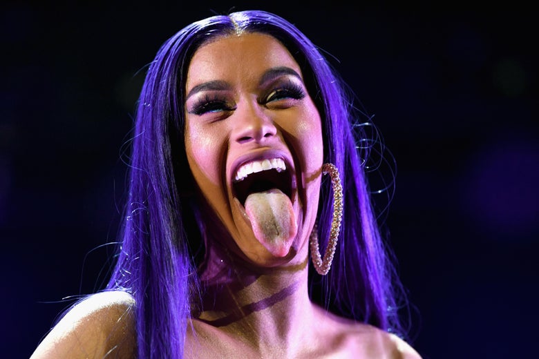 Image result for tongue out cardi b