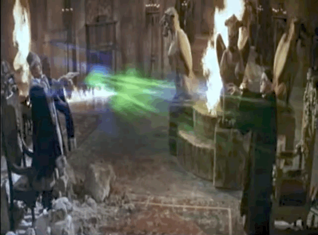 Two wizards shoot rays of light at each other.