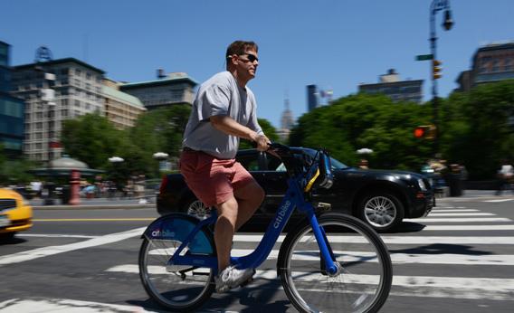 A man rides a Citi Bike bicycle near Union Square as the bike sharing system is launched.