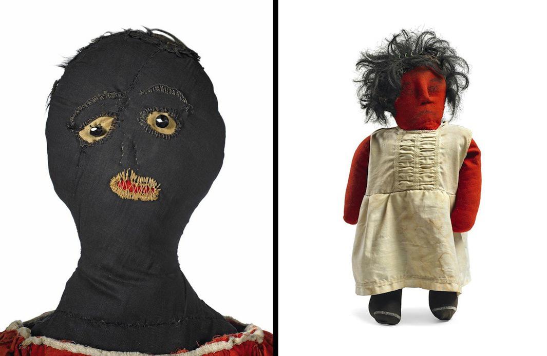 creepy black doll