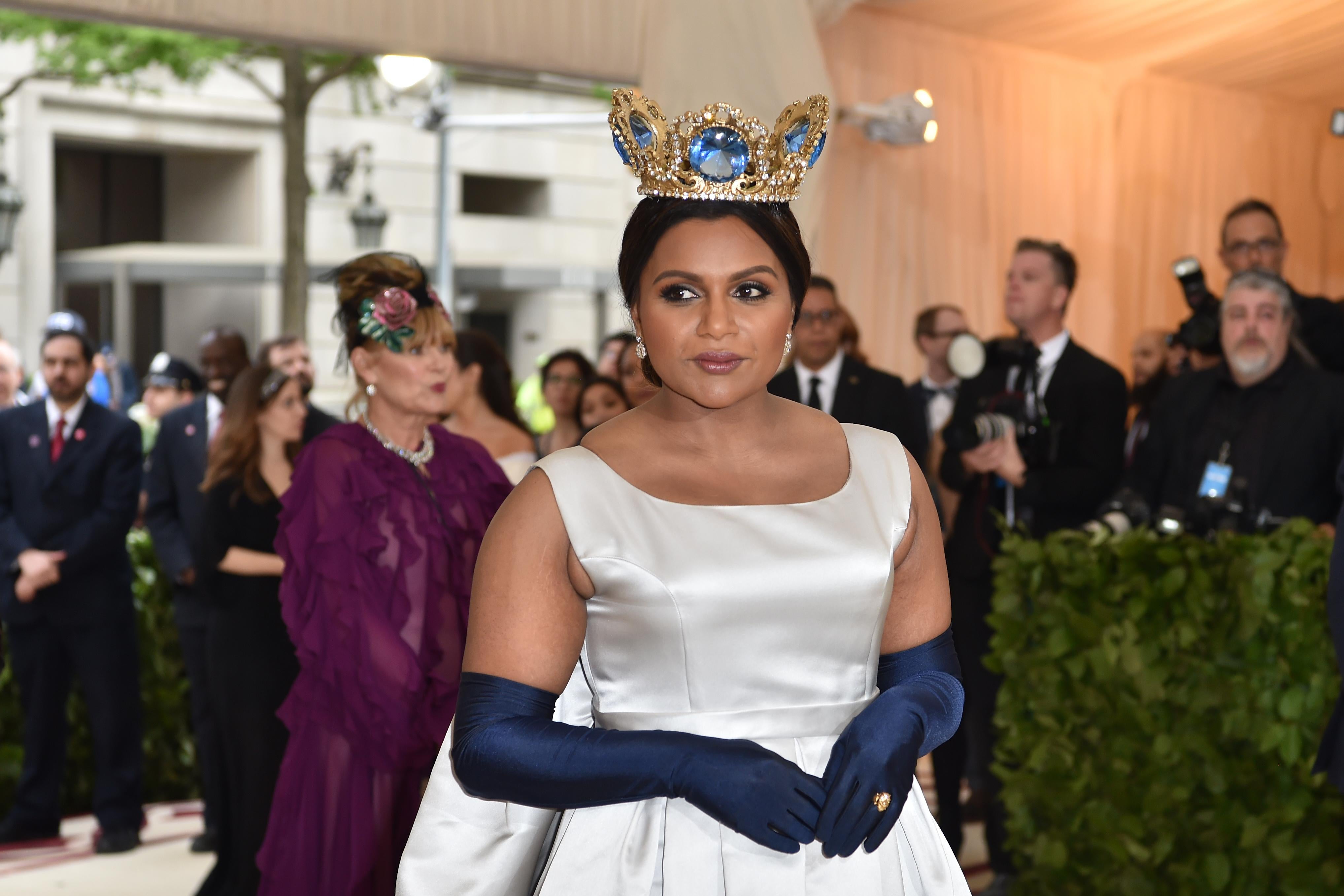 Actress Mindy Kaling arrives for the 2018 Met Gala on May 7, 2018, at the Metropolitan Museum of Art in New York. - The Gala raises money for the Metropolitan Museum of Arts Costume Institute. The Gala's 2018 theme is Heavenly Bodies: Fashion and the Catholic Imagination. (Photo by Hector RETAMAL / AFP) (Photo credit should read HECTOR RETAMAL/AFP/Getty Images)