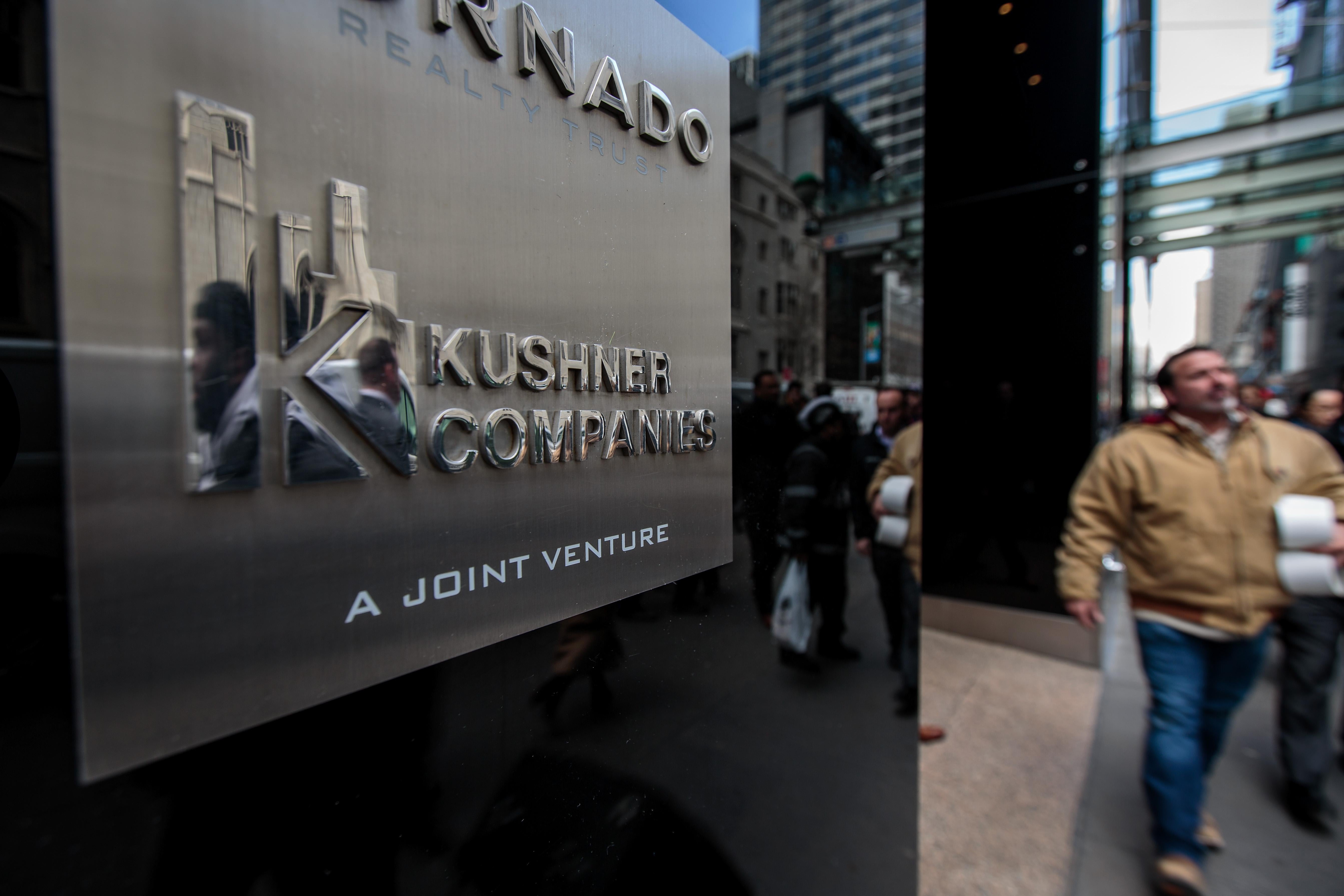 A Kushner Companies logo is visible near an entrance to the Kushner Companies' flagship property 666 Fifth Avenue in Midtown Manhattan, March 6, 2018 in New York City. 