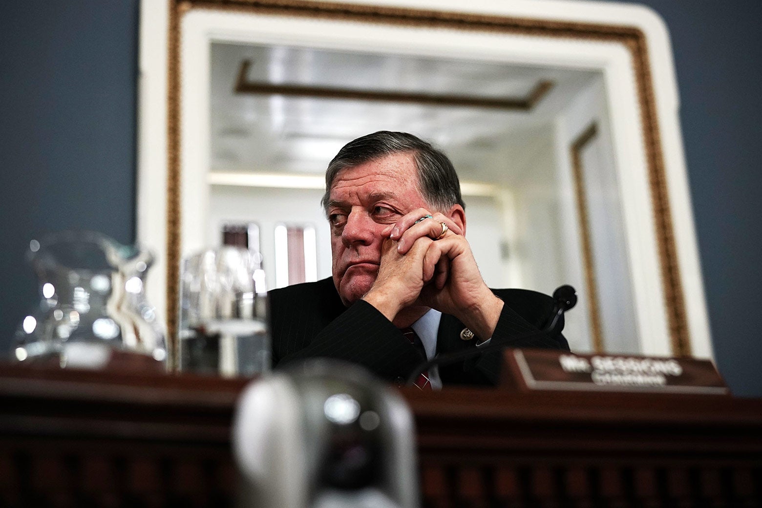 Oklahoma Rep. Tom Cole listens during a meeting about a bill to avert a government shutdown on Dec. 21 at the Capitol in Washington.