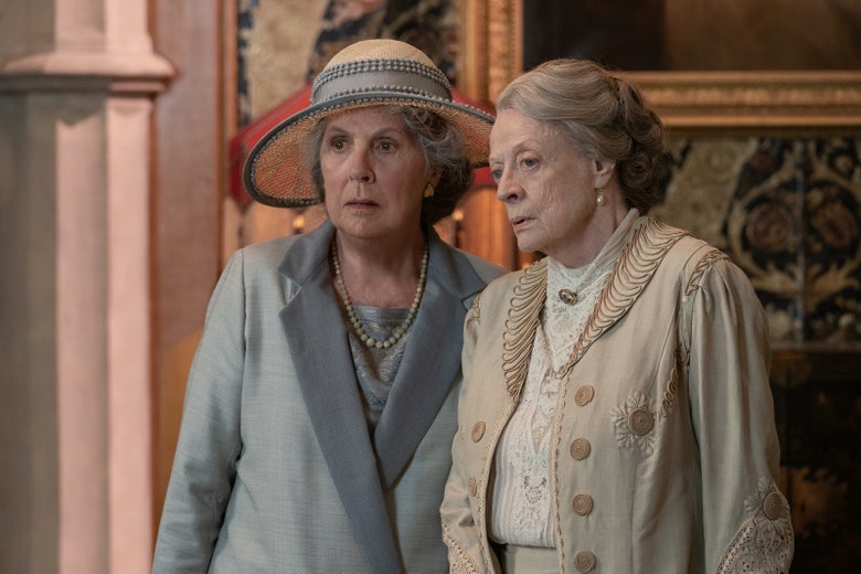 Penelope Wilton and Maggie Smith confer in fancy pastels while looking on in alarm