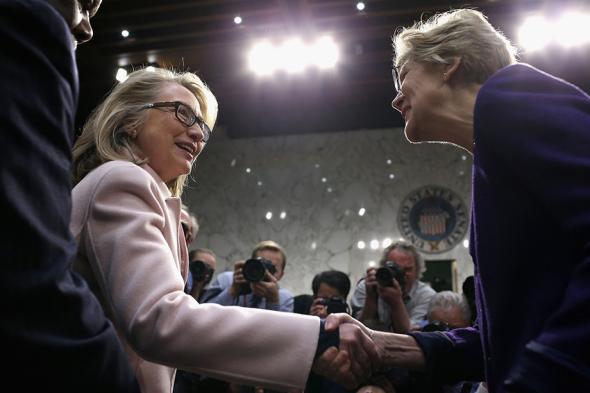 U.S. Secretary of State Hillary Clinton (L) greets Sen. Elizabet
