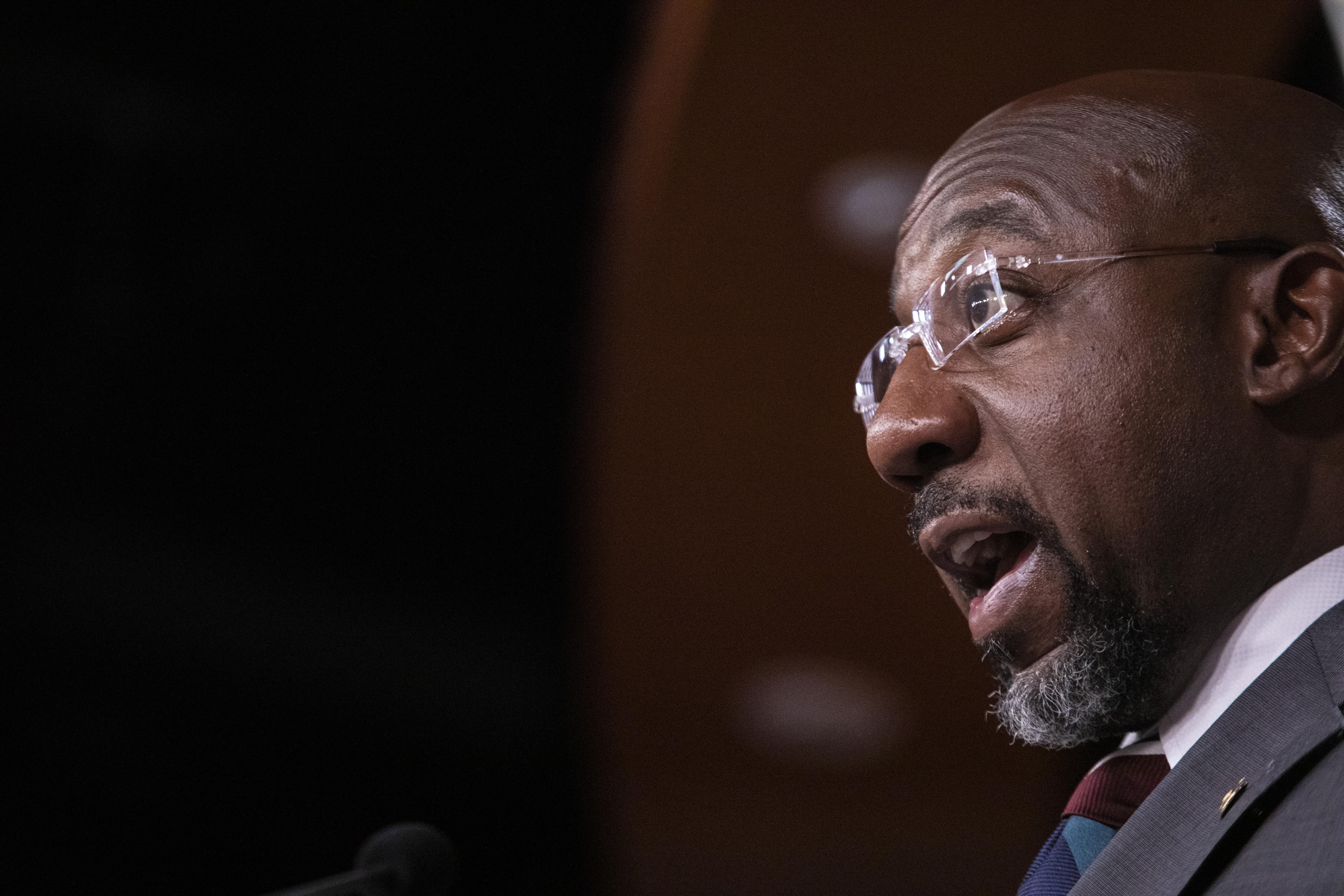 WASHINGTON, DC - JULY 26: Sen. Raphael Warnock (D-GA) speaks to reporters during a press conference following the weekly Democratic Party luncheon on July 26, 2022 at the U.S. Capitol in Washington, DC. The Democratic leadership addressed issues including the CHIPS+ legislation and cannabis legalization. (Photo by Anna Rose Layden/Getty Images)