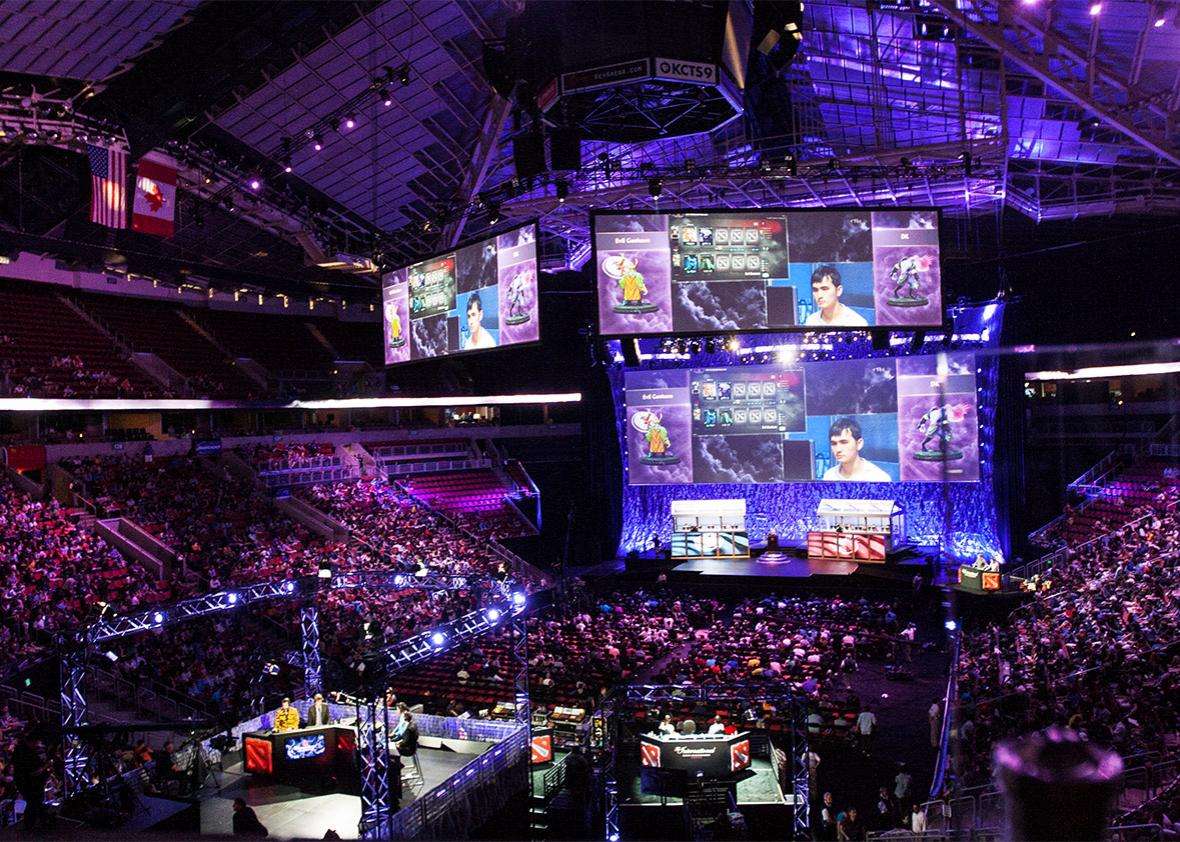 The stage and crowd at KeyArena for The International 2014.