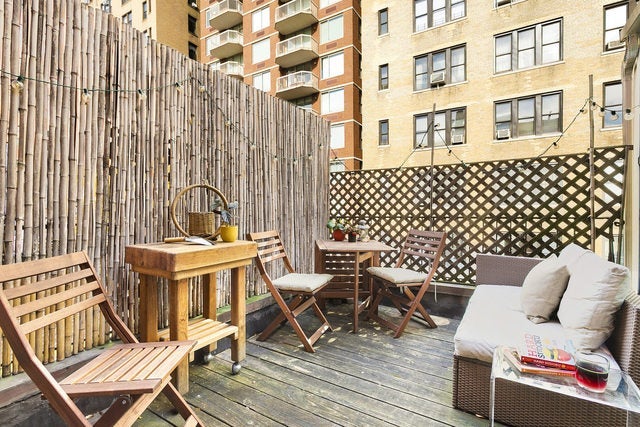 A patio with furniture