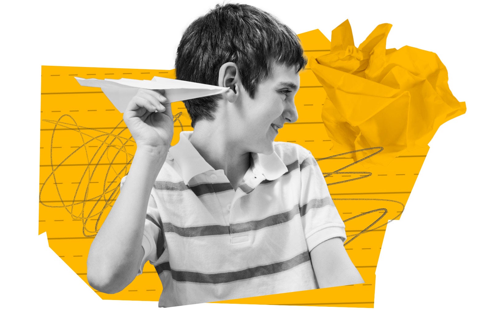 A boy throws a paper airplane in his classroom.