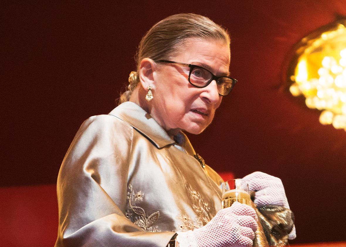 Supreme Court Justice Ruth Bader Ginsburg takes a refreshment during intermission at The Kennedy Center Honors December 6, 2015 in Washington, DC.   