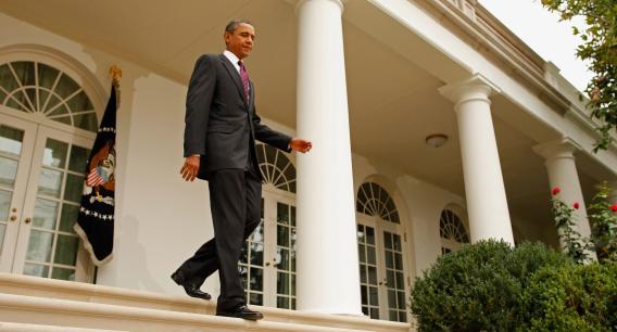 President Obama walks into the Rose Garden from the West Wing before delivering a statement on the economy at the White House Sept. 3, 2010