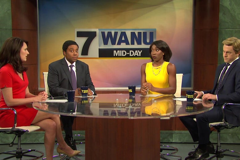 Phoebe Waller-Bridge, Kenan Thompson, Ego Nwodim, and Alex Moffatt sit behind a news desk. Thompson is trying to look innocent and failing.