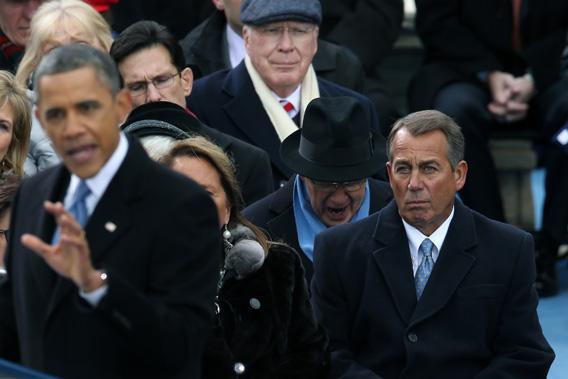 President Obama speaks as U.S. Speaker of the House Rep. John Boehner looks on during the presidential inauguration on the West Front of the U.S. Capitol, Jan. 21 