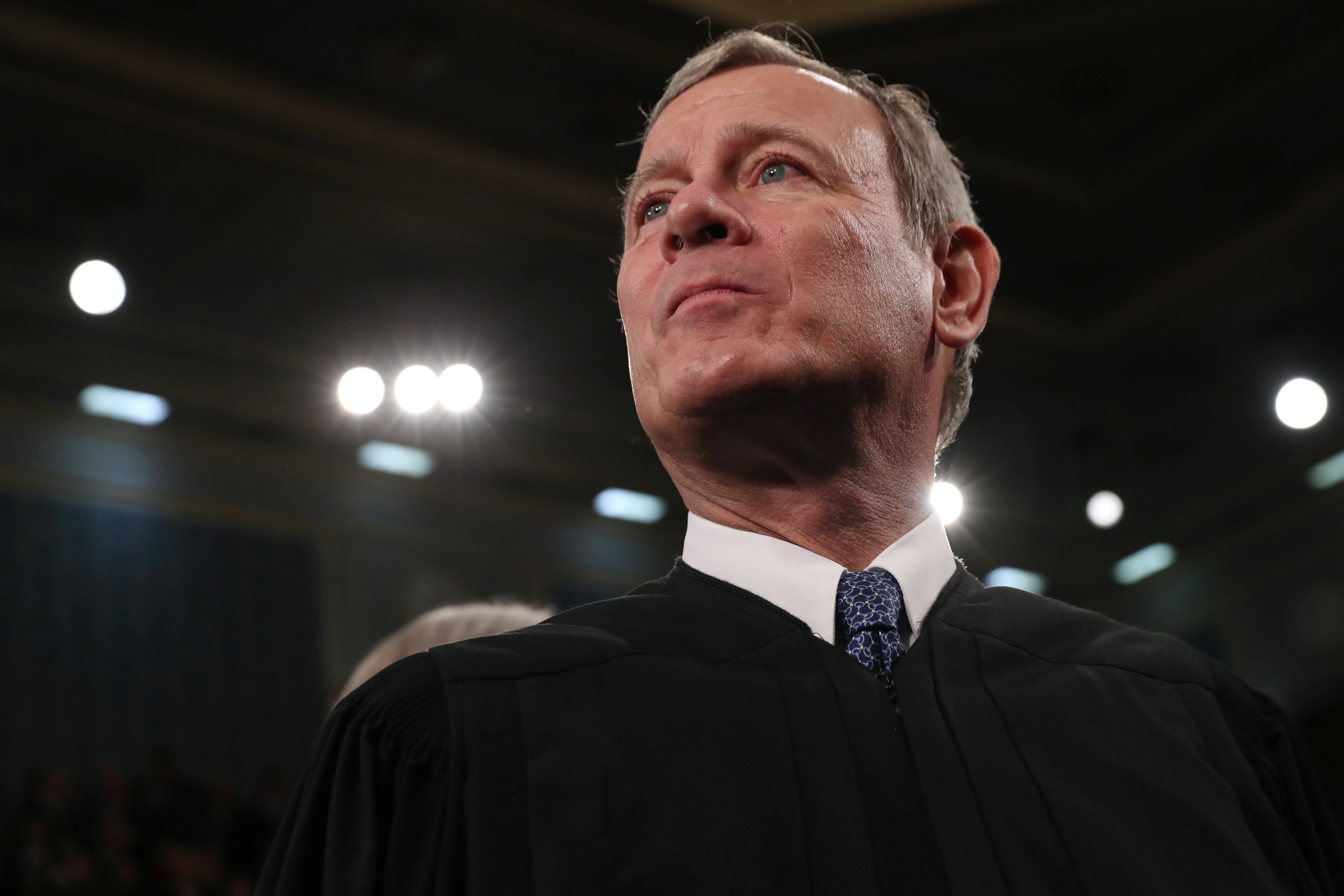 John Roberts looks up and off to the side. 