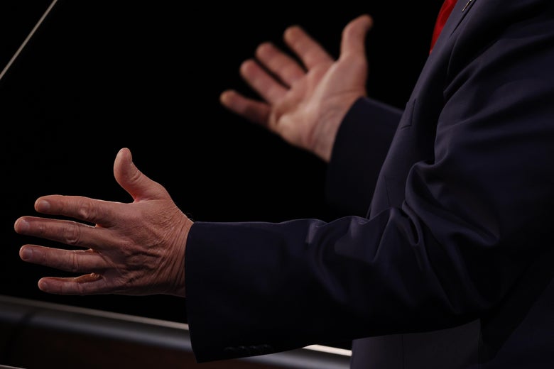 Close-up on Trump's hands gesturing above his lectern