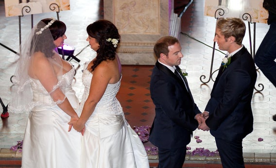 Jess Ives and Rachel Briscoe and Richard Rawstorn with Richard Andrew during the first same-sex marriage at the Rotorua Museum in Rotorua, New Zealand, on Aug. 19, 2013.