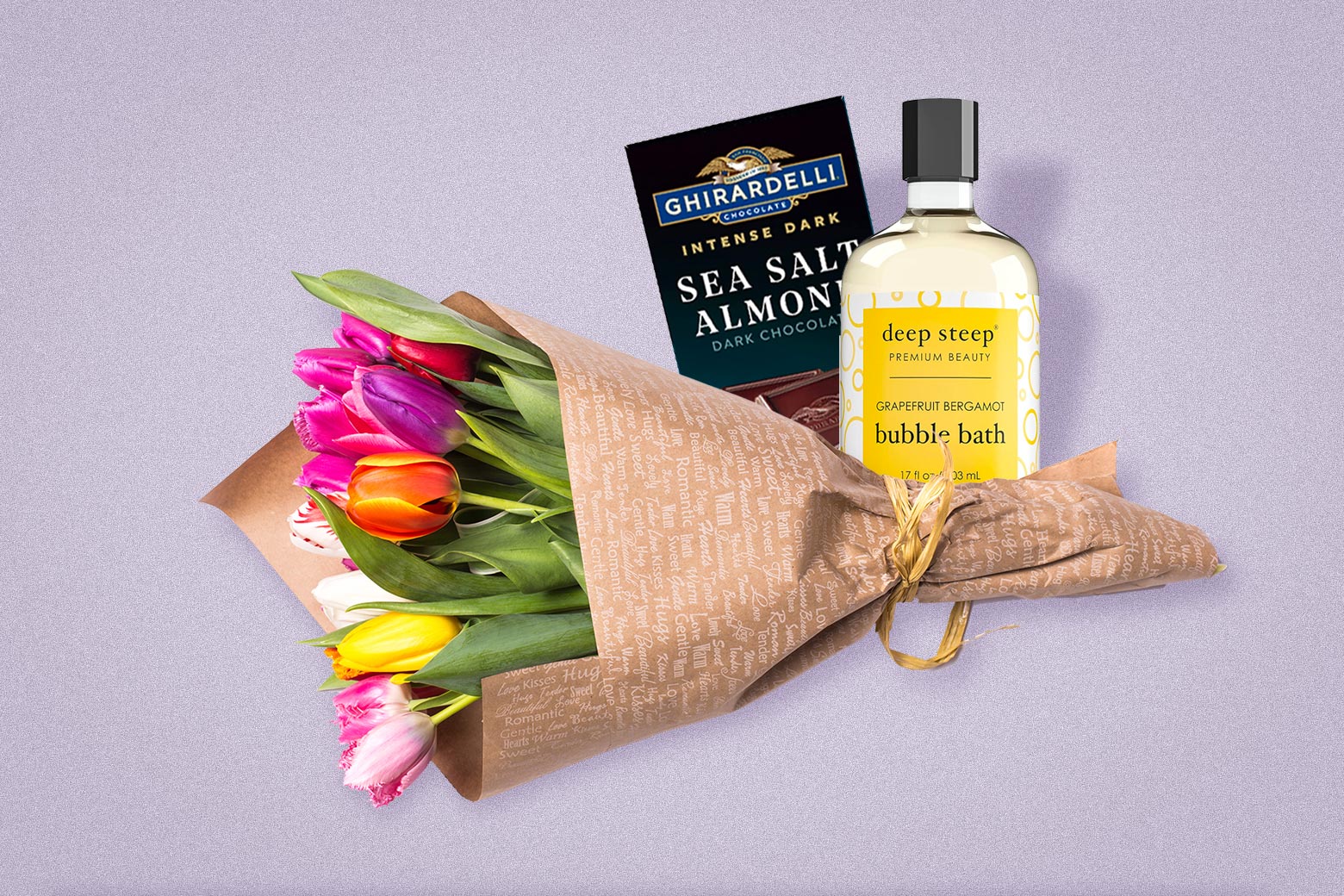 Luxury items, including a bouquet of tulips, Ghirardelli sea salt–almond dark chocolate, and grapefruit-scented bubble bath, against a purple background.