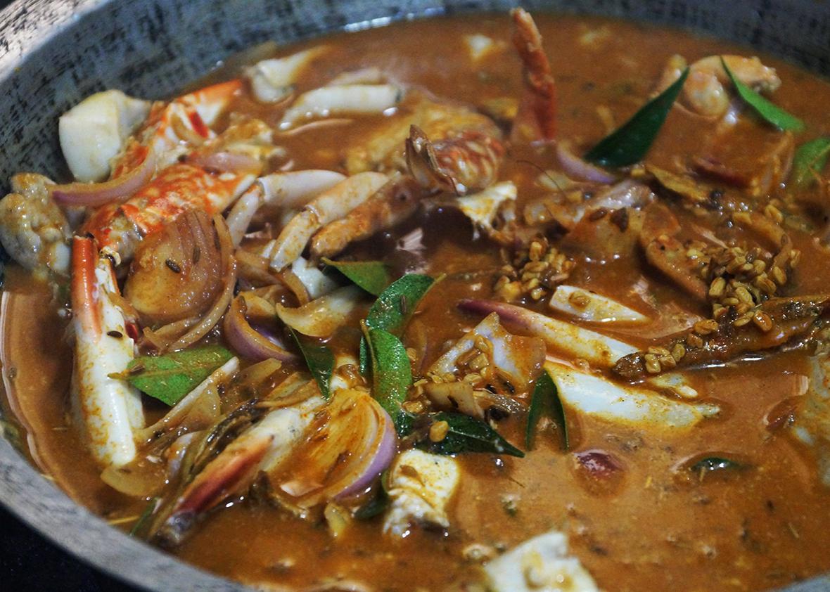 Mariyarani's crab and cuttlefish curry flavored with curry leaf, onion, and a masala of chili, coriander, black pepper, cumin and fennel.