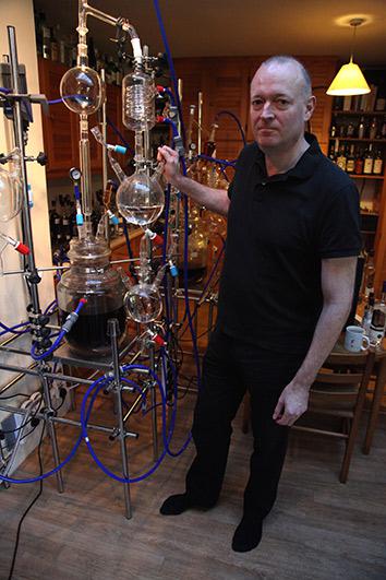 Ian Hart distilling Sacred Gin.