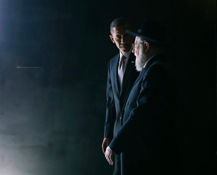 U.S. President Barack Obama walks with Rabbi Israel Meir Lau in the Hall of Remembrance during Obama's visit to the Yad Vashem Holocaust Memorial in Jerusalem on March 22, 2013.