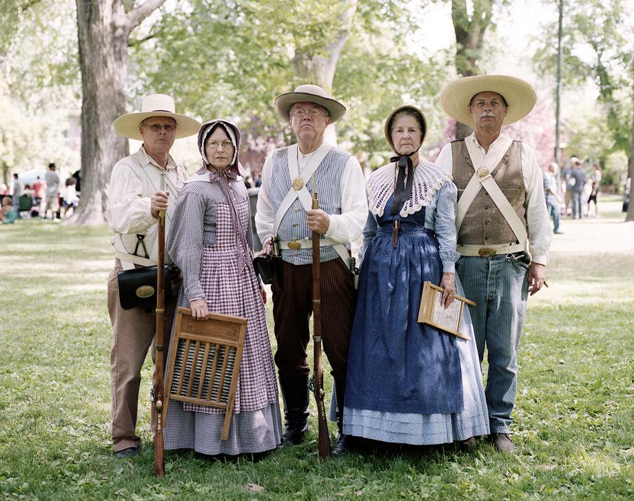 Every year, the state of Utah celebrates Pioneer Day on July 24th in honor of the Mormon pioneers that settled the Salt Lake Valley in the mid 1800s. Here, people dressed as pioneers pose after participating in the annual parade that makes its way through downtown Salt Lake City. 