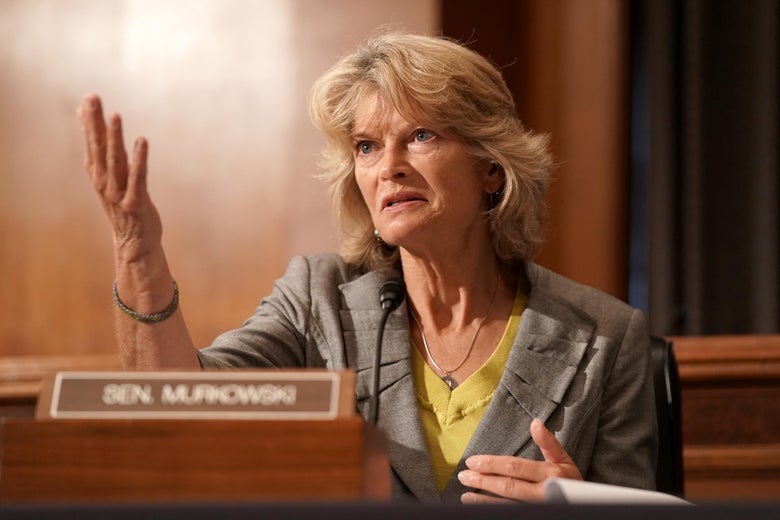 Lisa Murkowski gestures while speaking during a hearing.
